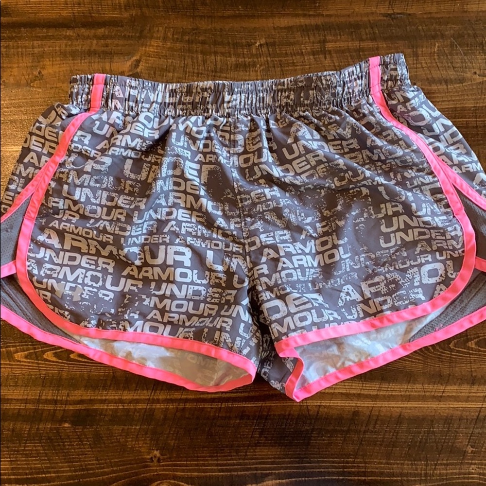 UnderArmour pink and grey semi-fitted running shorts.